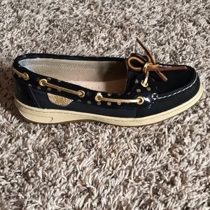 Sperry black and gold shoes